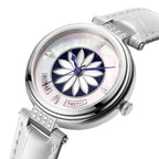 Watch with white strap and floral design on face against white background